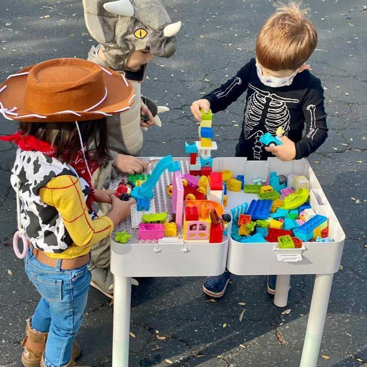 kids playing with duplo table with storage
