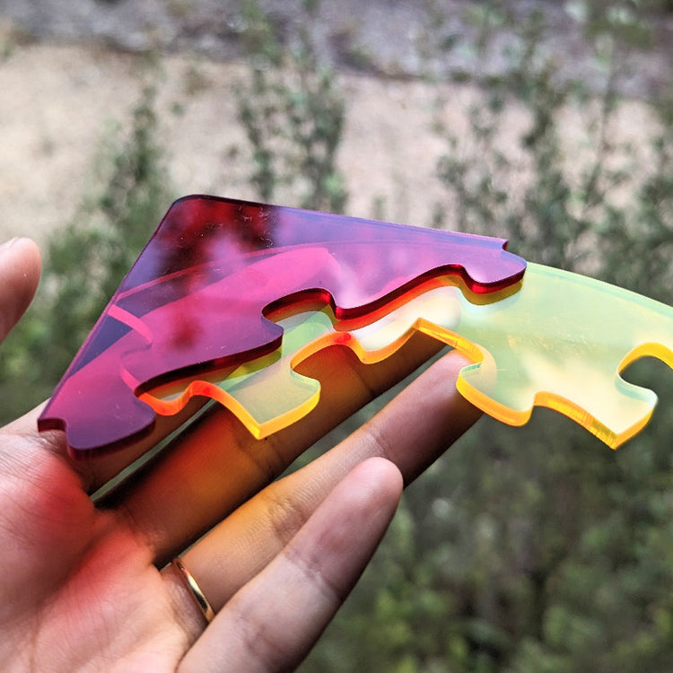 Translucent acrylic trianglular geometric puzzle pieces